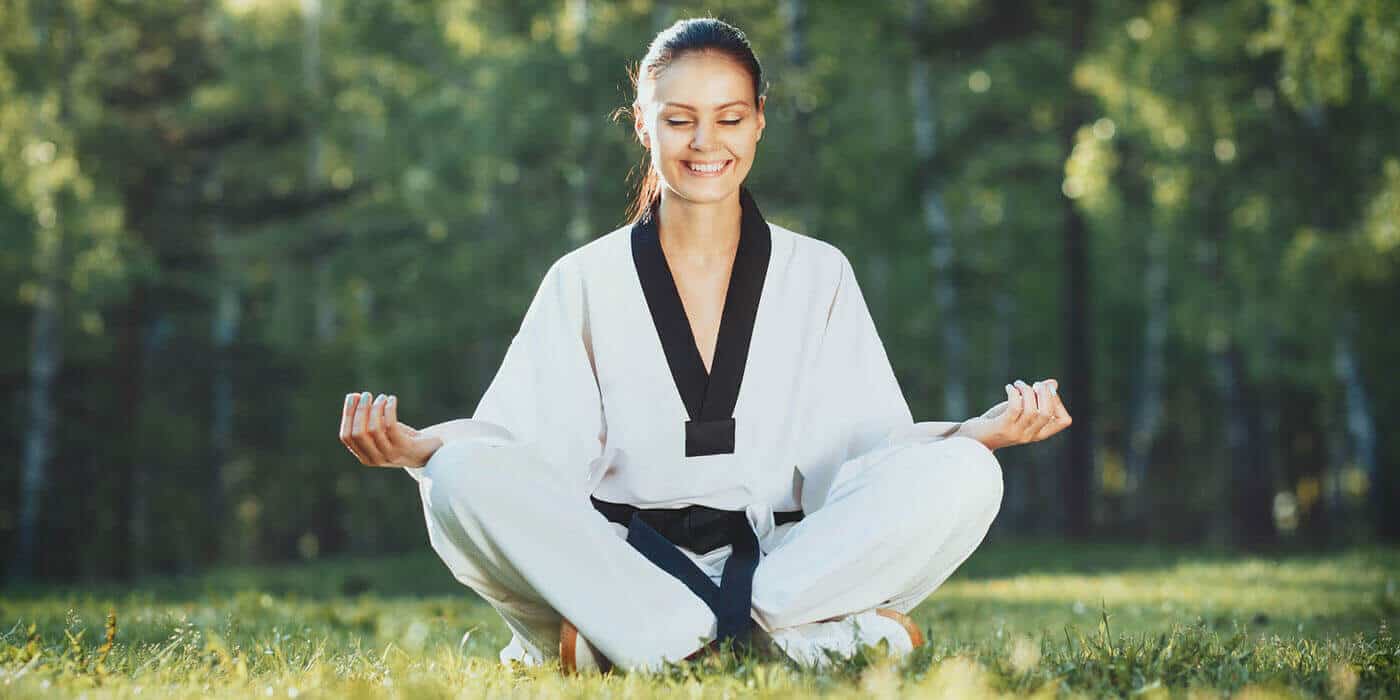 Martial Arts Lessons for Adults in Danvers MA - Happy Woman Meditated Sitting Background
